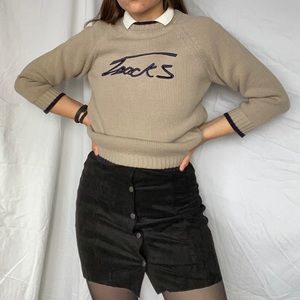 Brown sweater tan cream